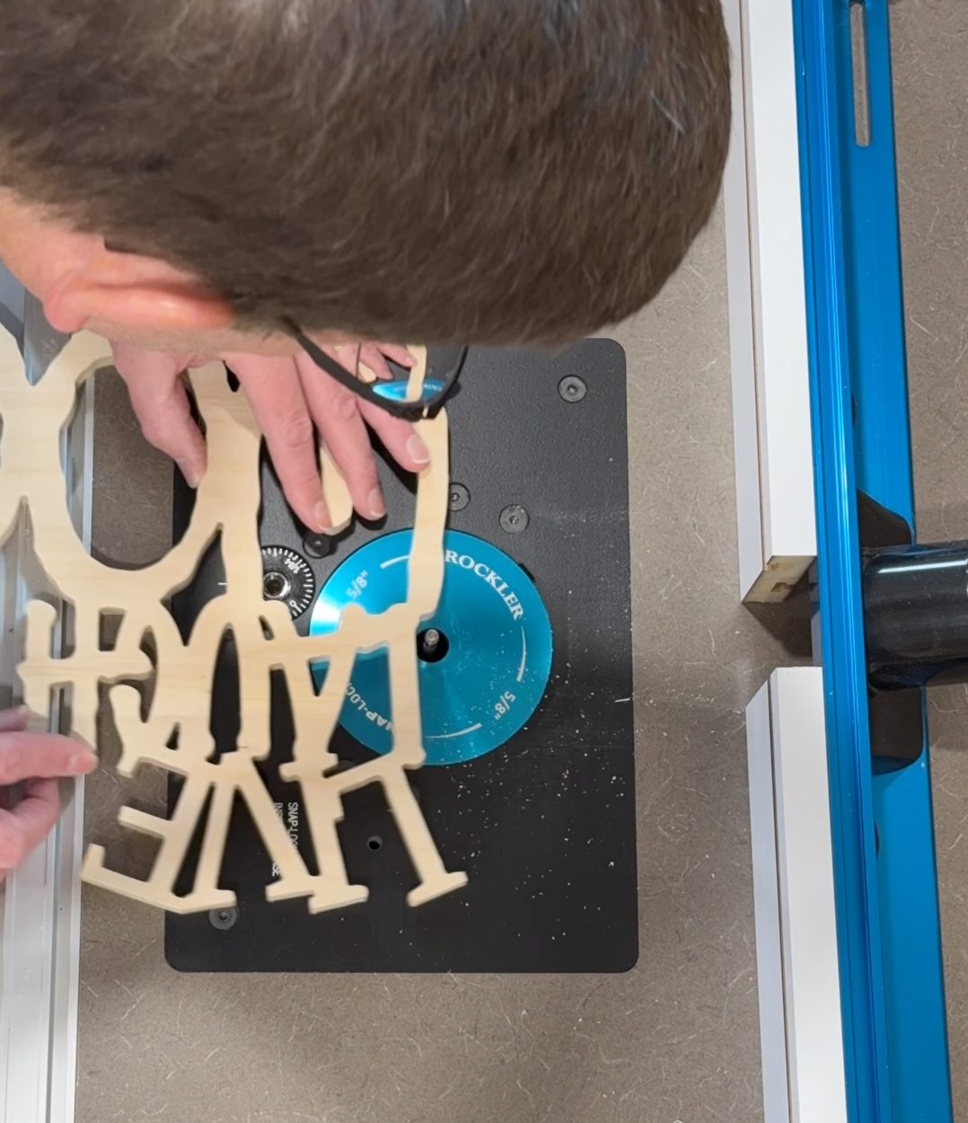 Edge trimming Live Laugh Love sign